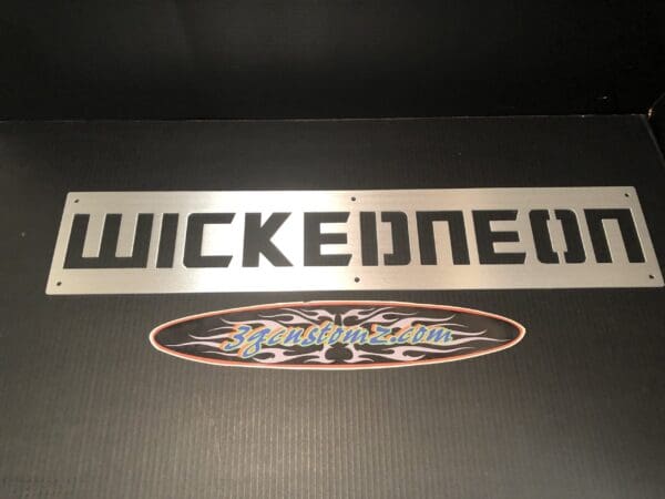 Logo plate with text "WICKEDNEON" above URL "3gzcustomz.com" on a textured black background.