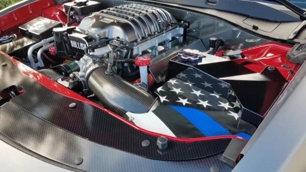 The engine of a car with an american flag on it