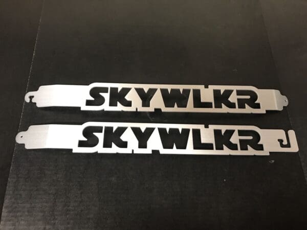 A pair of sky walker decals on a table