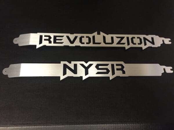 A pair of new york revolution license plates