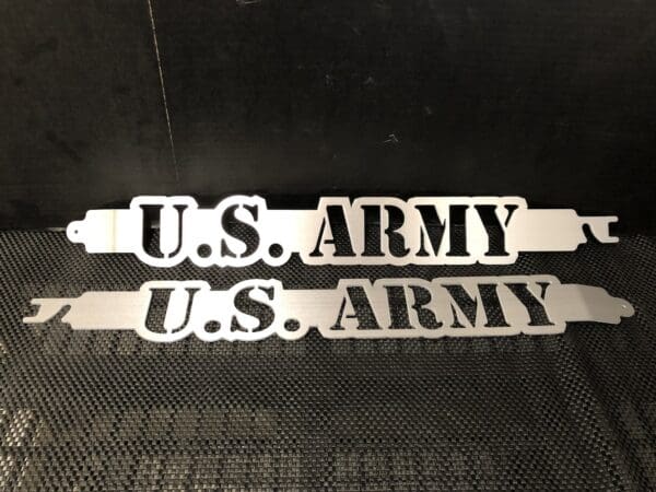 A metal sign that says u s army and u s army