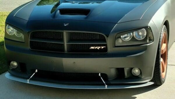 The front of a black dodge charger