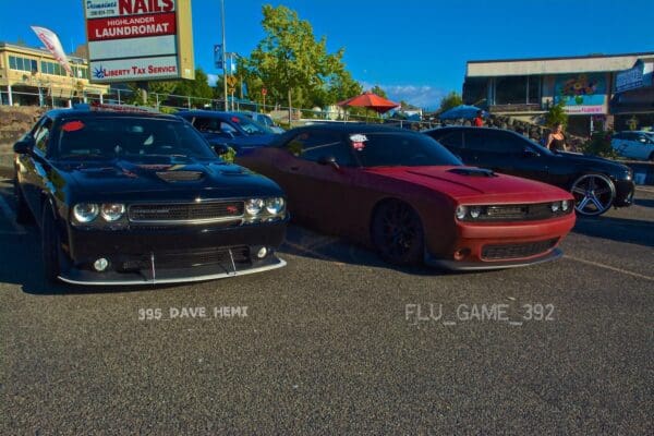 A couple of cars parked in a parking lot