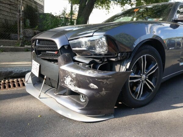 The front of a car that has been badly damaged