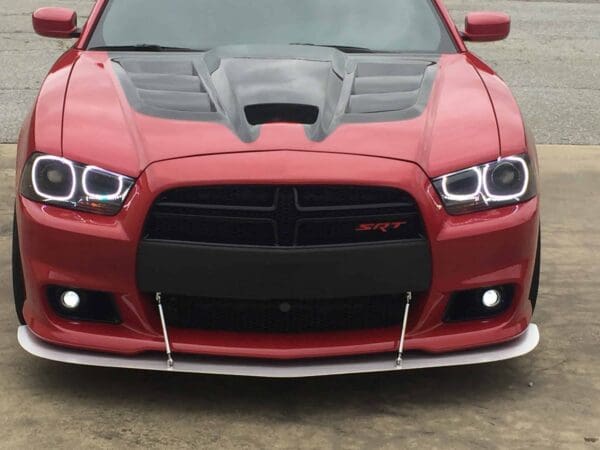 The front of a red dodge charger