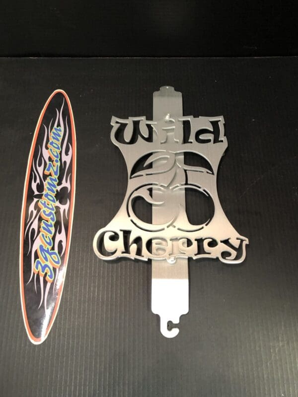 A metal hood prop with the word WILD CHERRY on it