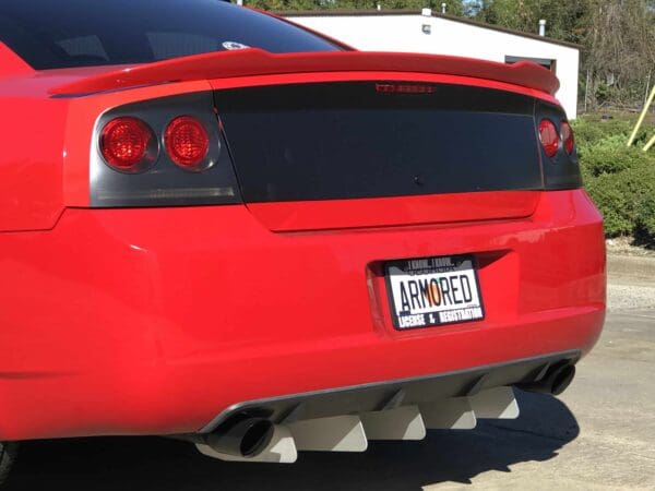 The rear end of a red sports car