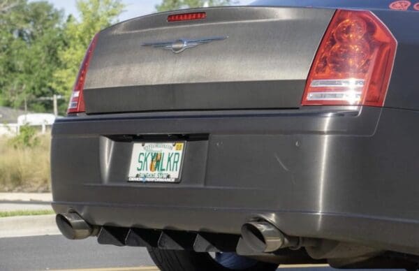 The back end of a car with a license plate