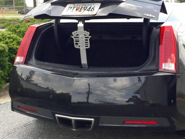 The back of a car with a license plate on it