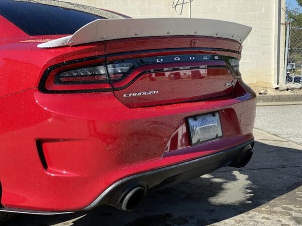 The rear end of a red sports car