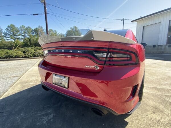 The rear end of a red sports car