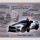 A woman stands next to a customized 2022 Ford Mustang Mach 1, showcasing performance details and owner information.